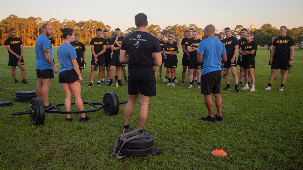 U.S. Army cadets conduct physical training with 3rd Infantry Division senior enlisted leader