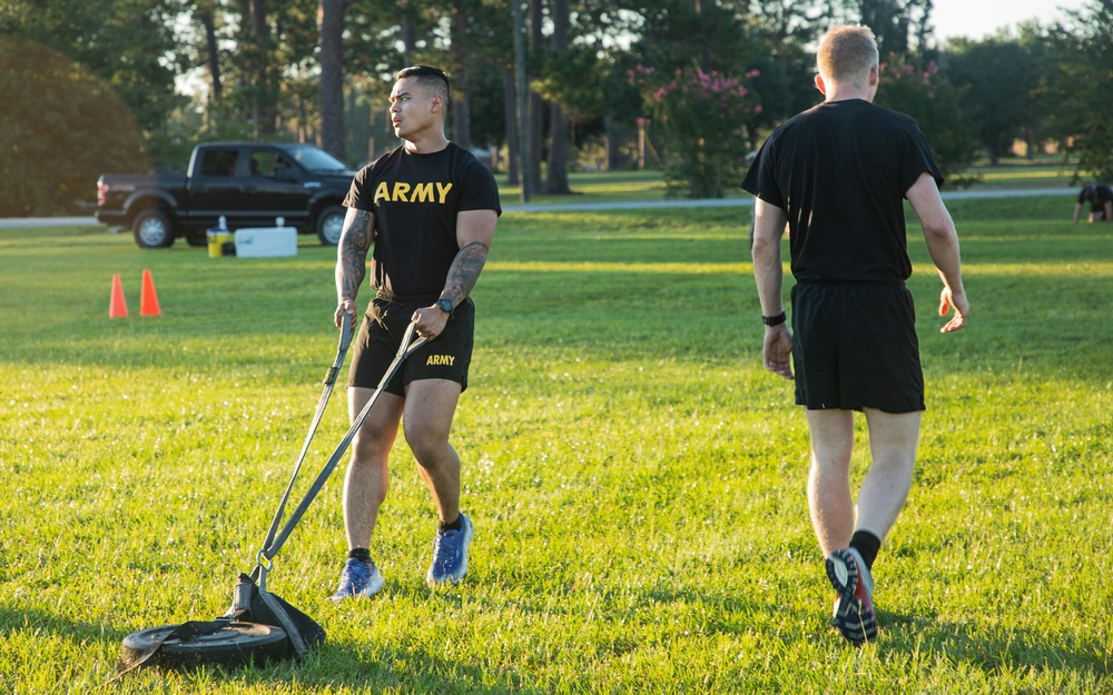 U.S. Army cadets conduct physical training with 3rd Infantry Division senior enlisted leader