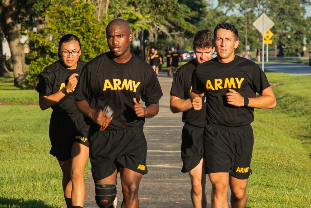 U.S. Army cadets conduct physical training with 3rd Infantry Division senior enlisted leader