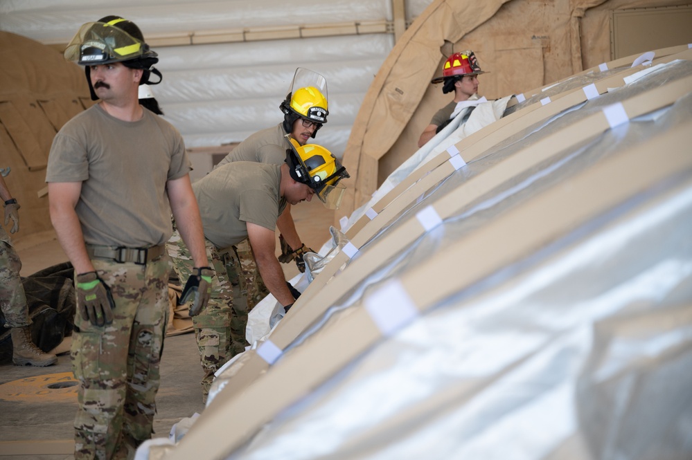 CE Builds tents for aircraft maintainers in a deployed location