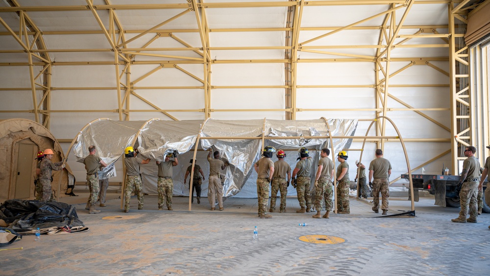 CE Builds tents for aircraft maintainers in a deployed location