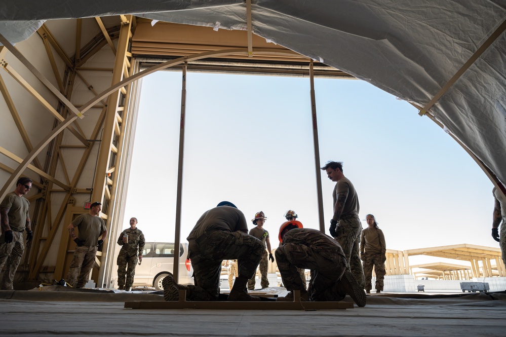 CE Builds tents for aircraft maintainers in a deployed location
