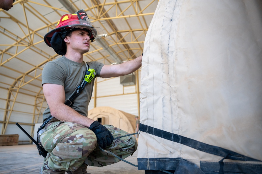 CE Builds tents for aircraft maintainers in a deployed location