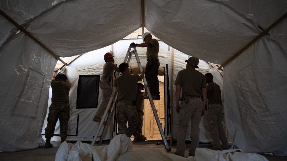 CE Builds tents for aircraft maintainers in a deployed location