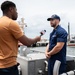 Coast Guard rescue crew conducts interview with local media