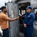 Coast Guard rescue crew conducts interview with local media