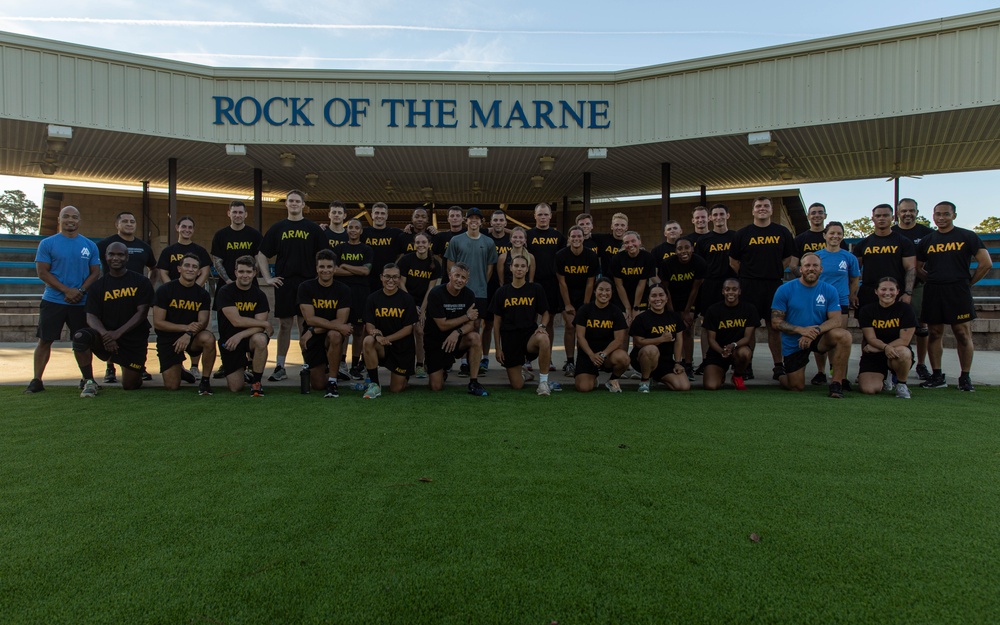 U.S. Army cadets conduct physical training with 3rd Infantry Division senior enlisted leader