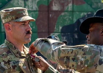 Chief Warrant Officer Four Jose C. Garcia is Awarded the Meritorious Service Medal