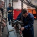 Sailors Prepare To Hoist An Ordnance Shell