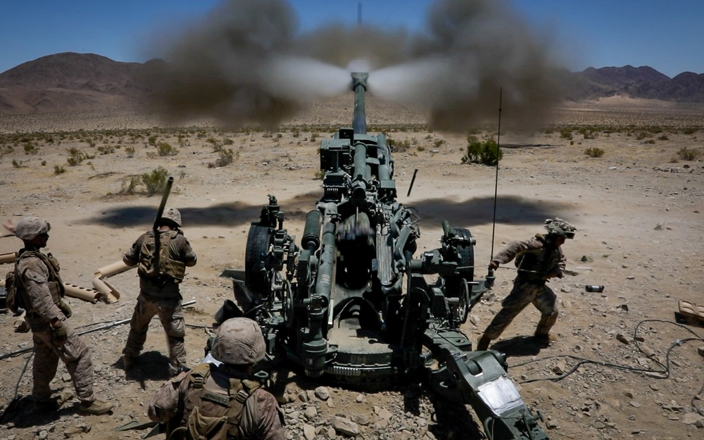 Marines fire artillery during Integrated Training Exercise 4-24