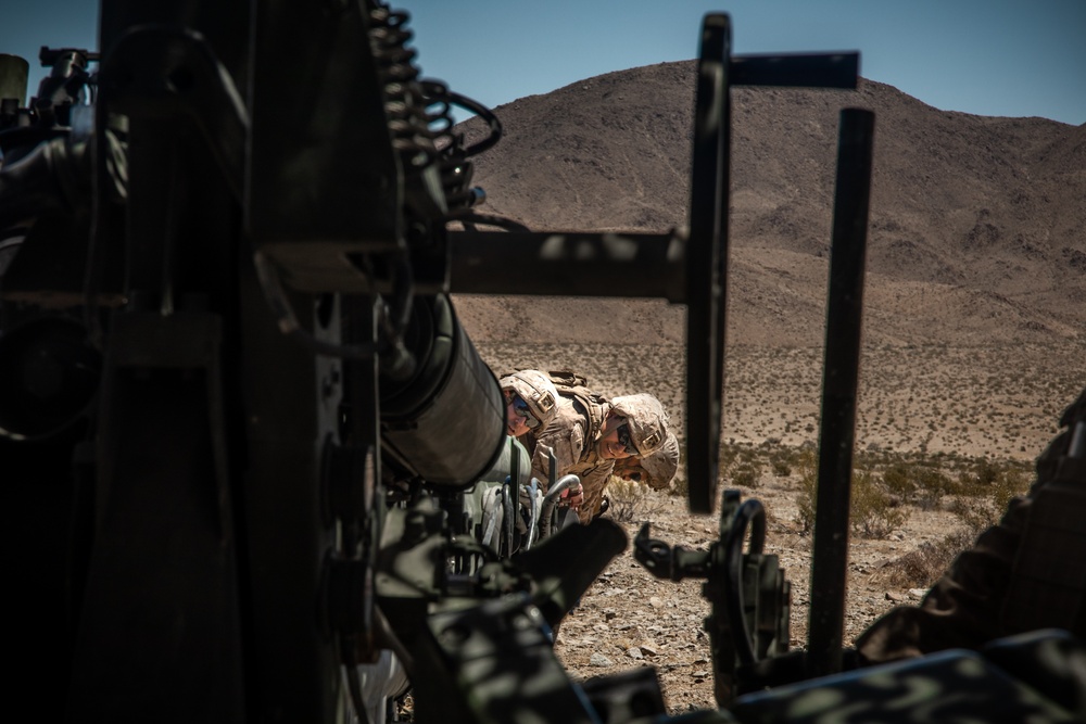 Marines fire artillery during Integrated Training Exercise 4-24