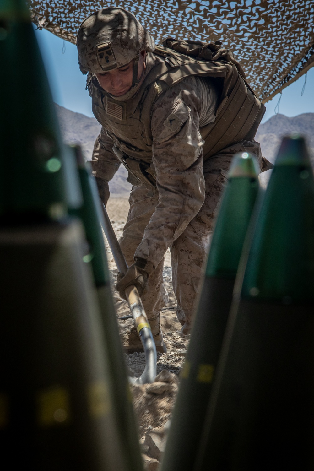 Marines fire artillery during Integrated Training Exercise 4-24