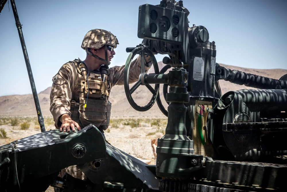 Marines fire artillery during Integrated Training Exercise 4-24