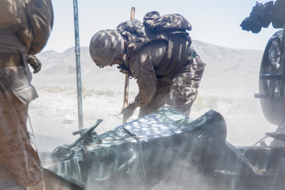 Marines fire artillery during Integrated Training Exercise 4-24