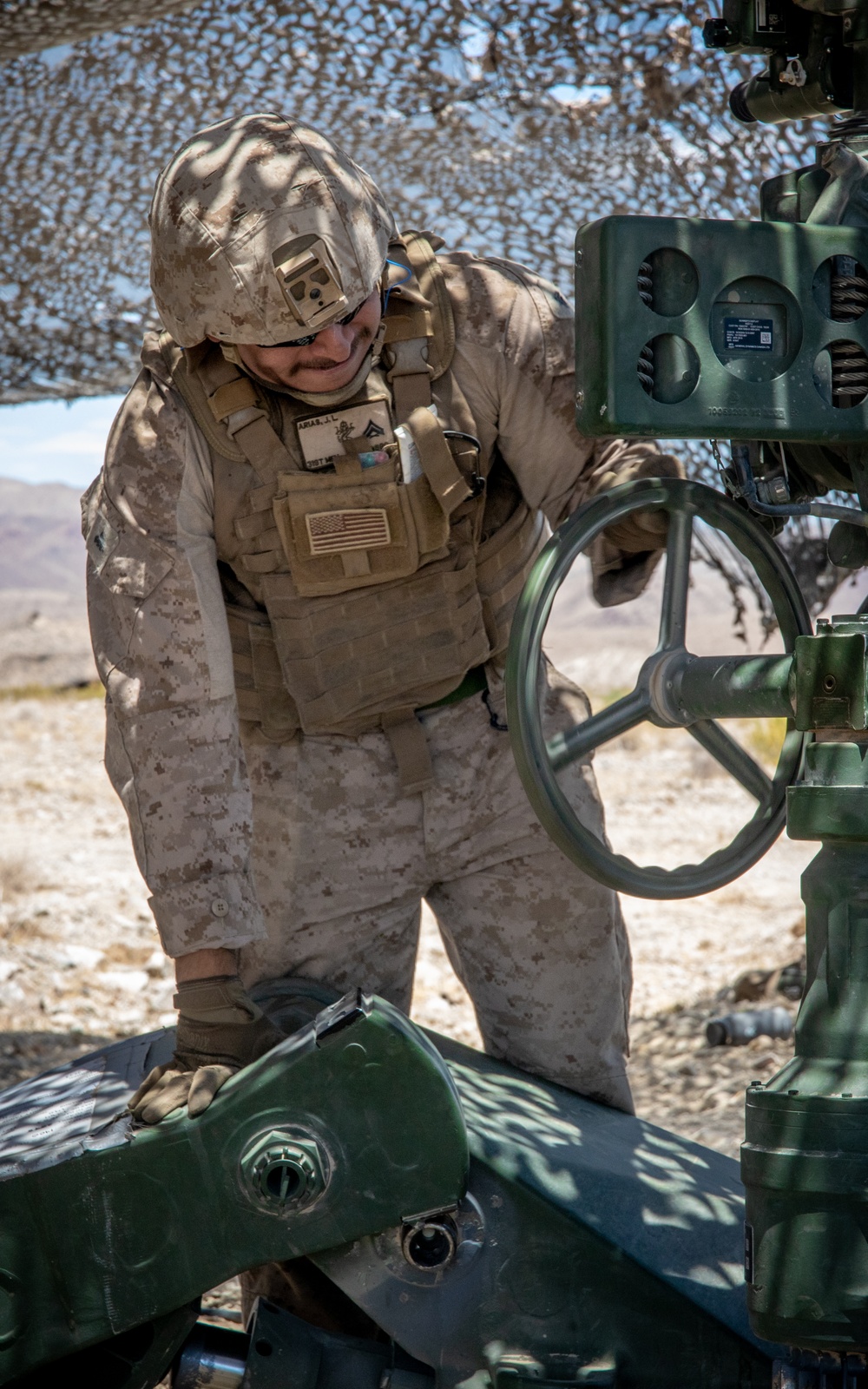 Marines fire artillery during Integrated Training Exercise 4-24