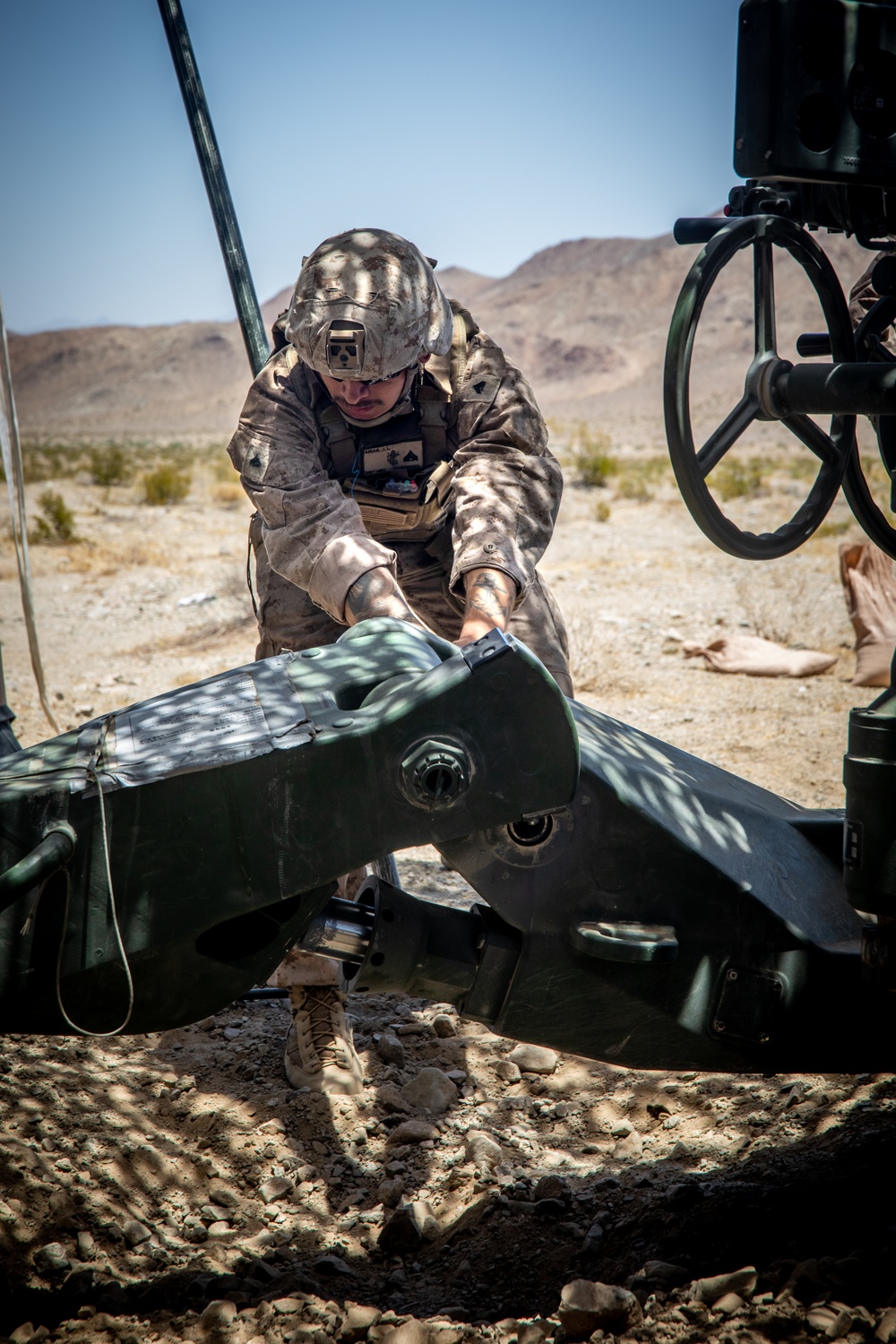 Marines fire artillery during Integrated Training Exercise 4-24