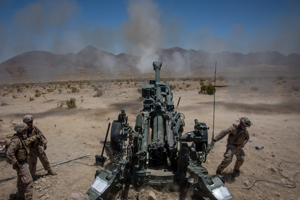 Marines fire artillery during Integrated Training Exercise 4-24