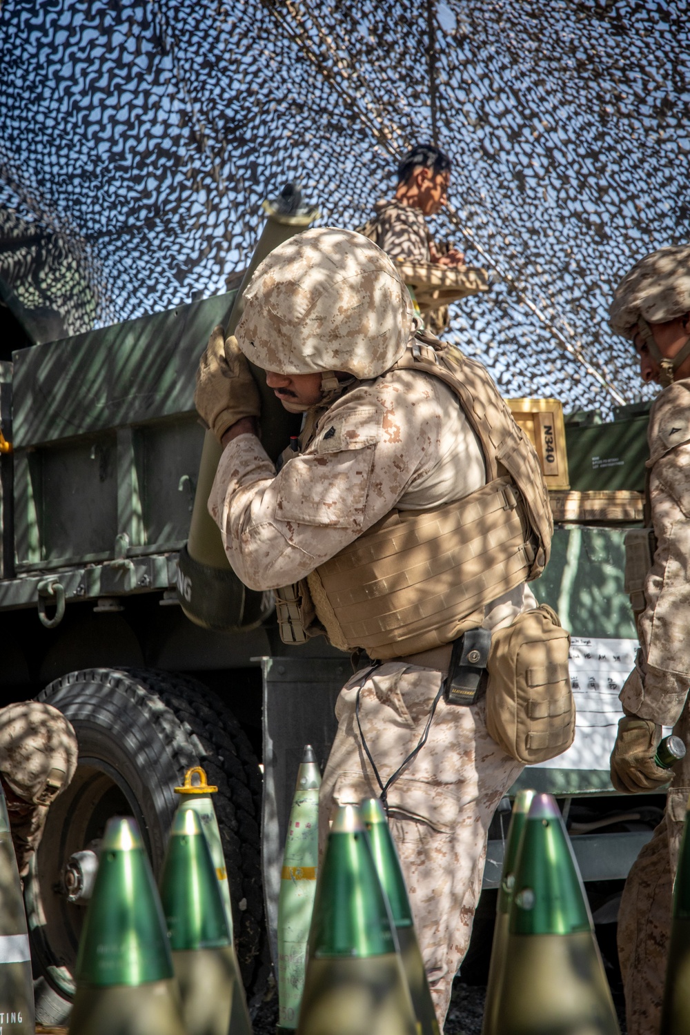 Marines fire artillery during Integrated Training Exercise 4-24