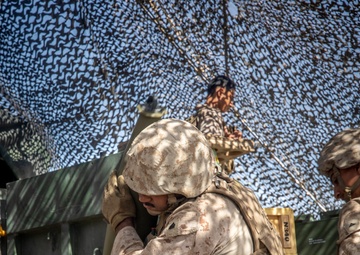 Marines fire artillery during Integrated Training Exercise 4-24