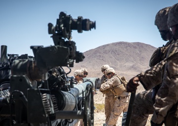 Marines fire artillery during Integrated Training Exercise 4-24