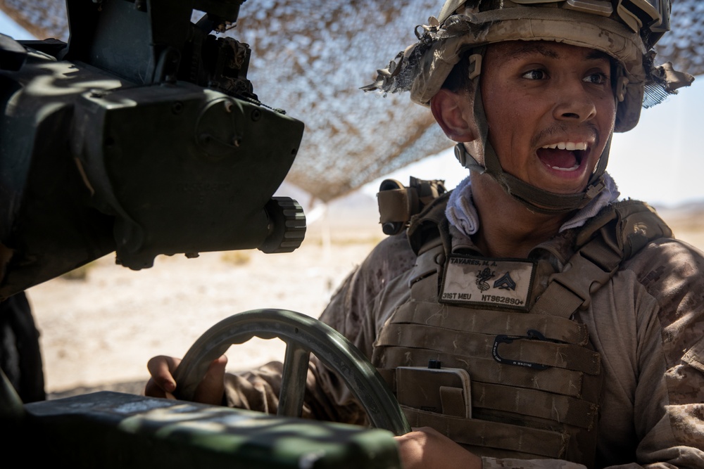 Marines fire artillery during Integrated Training Exercise 4-24