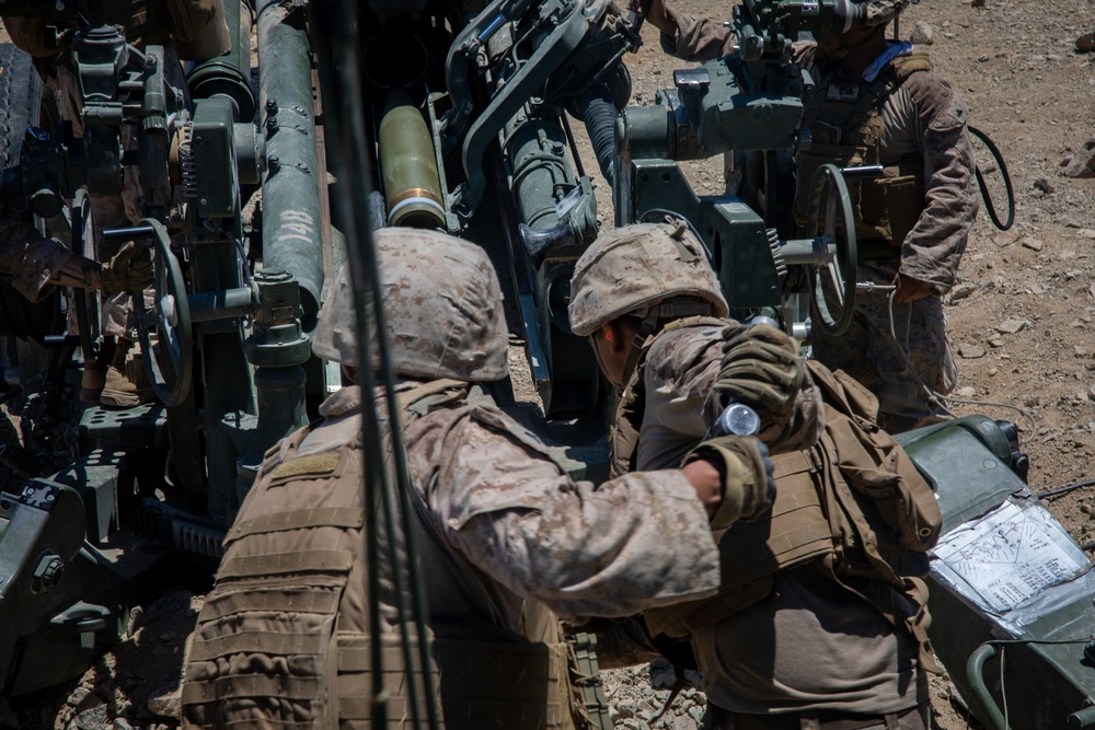 Marines fire artillery during Integrated Training Exercise 4-24