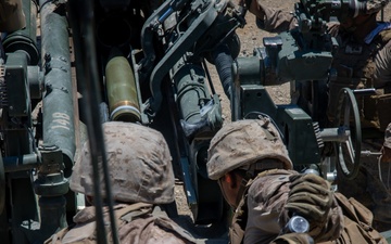 Marines fire artillery during Integrated Training Exercise 4-24