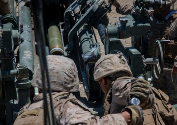 Marines fire artillery during Integrated Training Exercise 4-24
