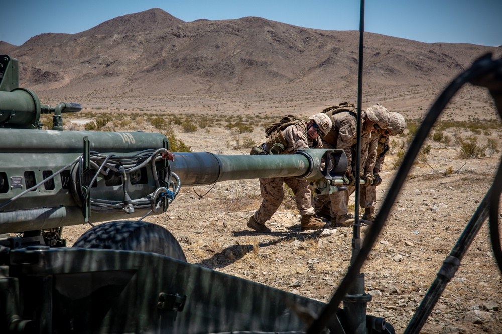 Marines fire artillery during Integrated Training Exercise 4-24