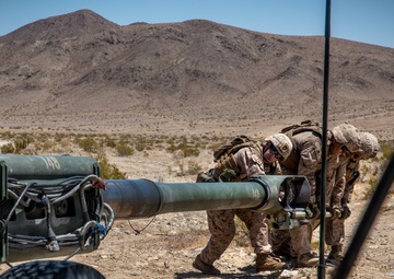 Marines fire artillery during Integrated Training Exercise 4-24