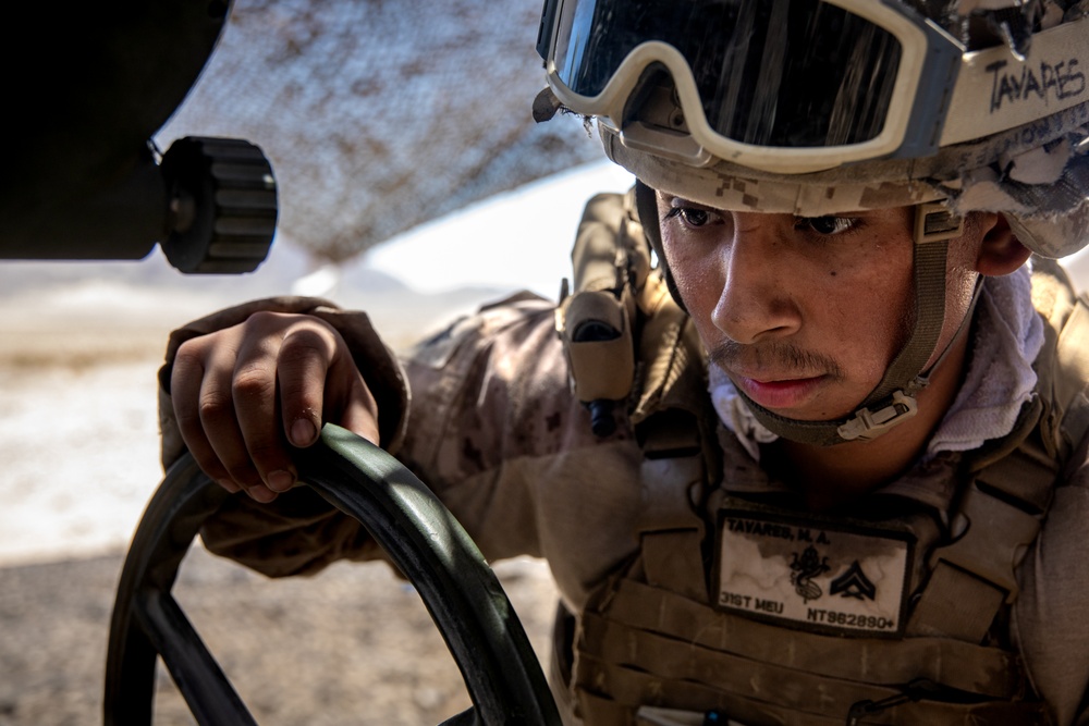 Marines fire artillery during Integrated Training Exercise 4-24