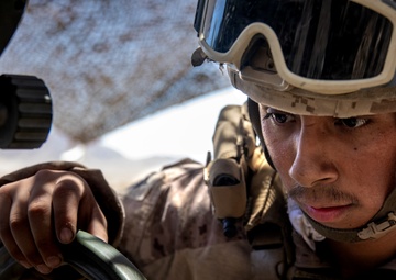Marines fire artillery during Integrated Training Exercise 4-24