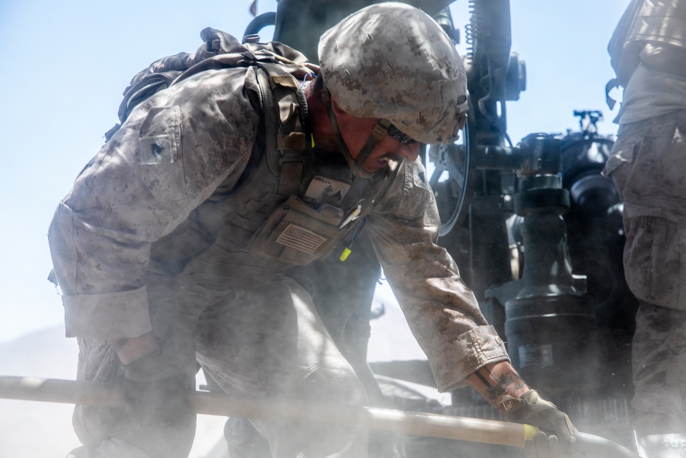 Marines fire artillery during Integrated Training Exercise 4-24