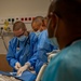 US and Angolan military healthcare teams work together in the ER