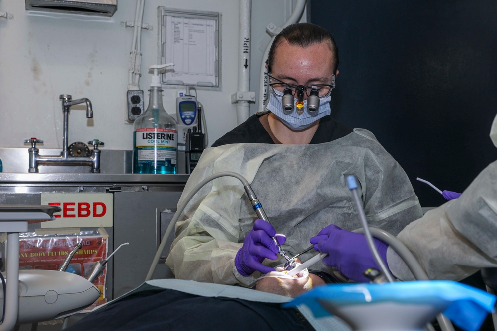 Wasp Dental Officer Performs Filling Underway