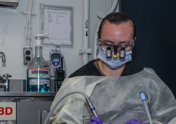 Wasp Dental Officer Performs Filling Underway