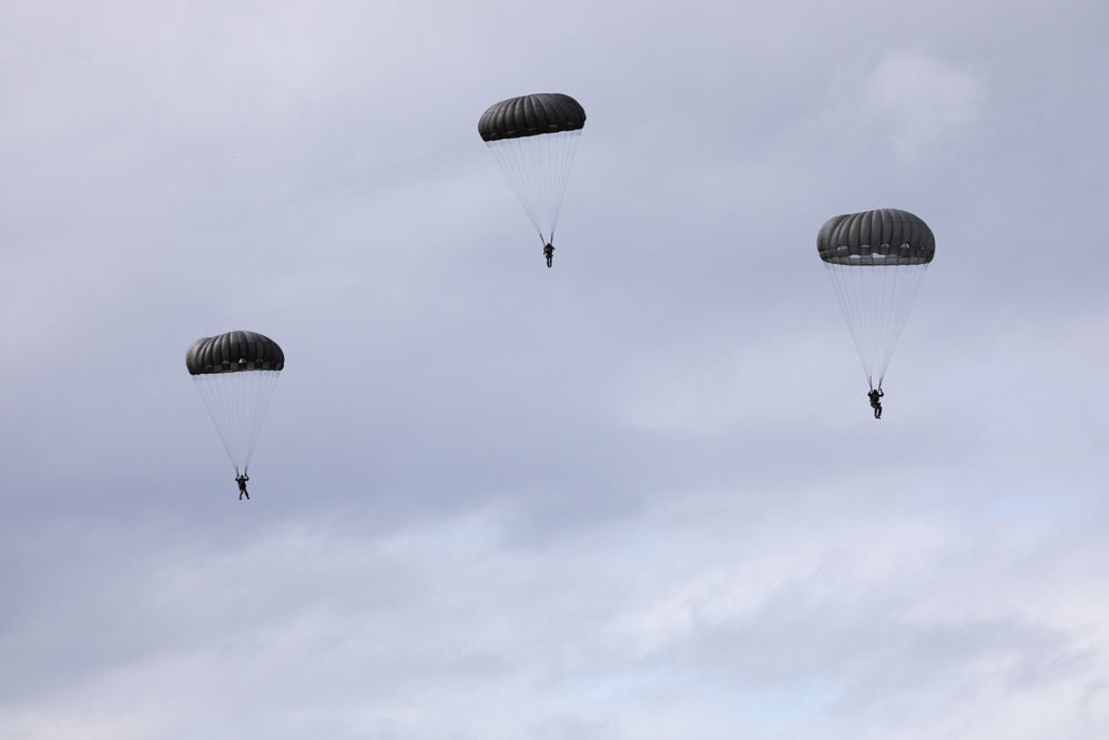 Alaska Air National Guard aviators and Air Force Special Warfare Airmen conduct airborne training