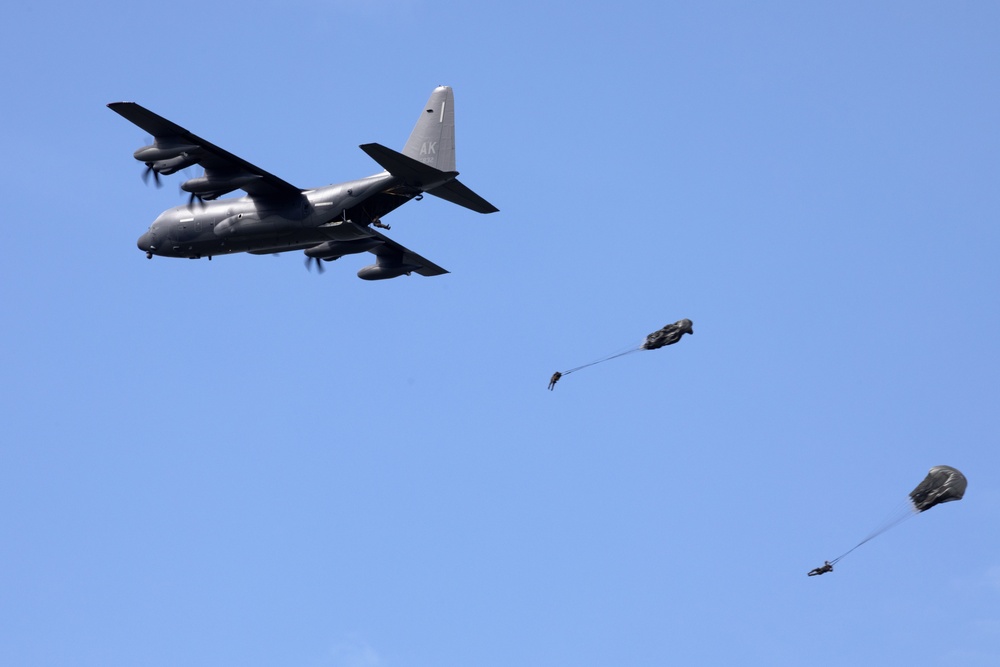 Alaska Air National Guard aviators and Air Force Special Warfare Airmen conduct airborne training