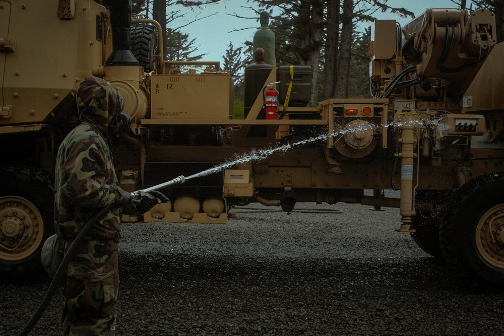 Washington National Guard CBRN Soldiers demonstrate decontamination during annual training