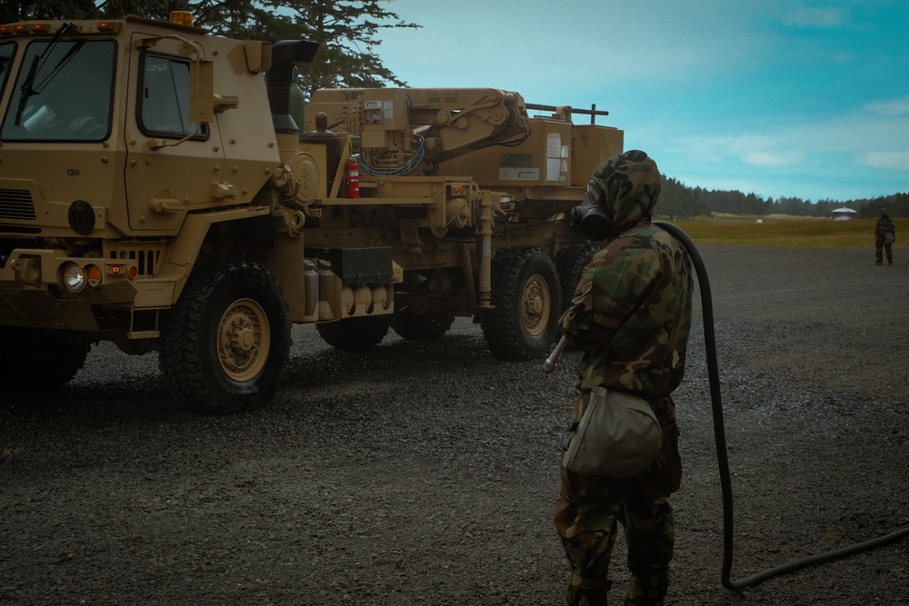 Washington National Guard CBRN Soldiers demonstrate decontamination during annual training