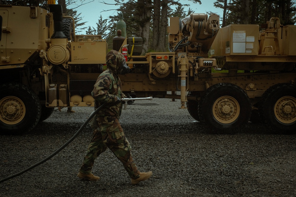 Washington National Guard CBRN Soldiers demonstrate decontamination during annual training