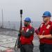 Sailors aboard the USS Howard conduct a replenishment-at-sea with the USNS Big Horn in the South China sea