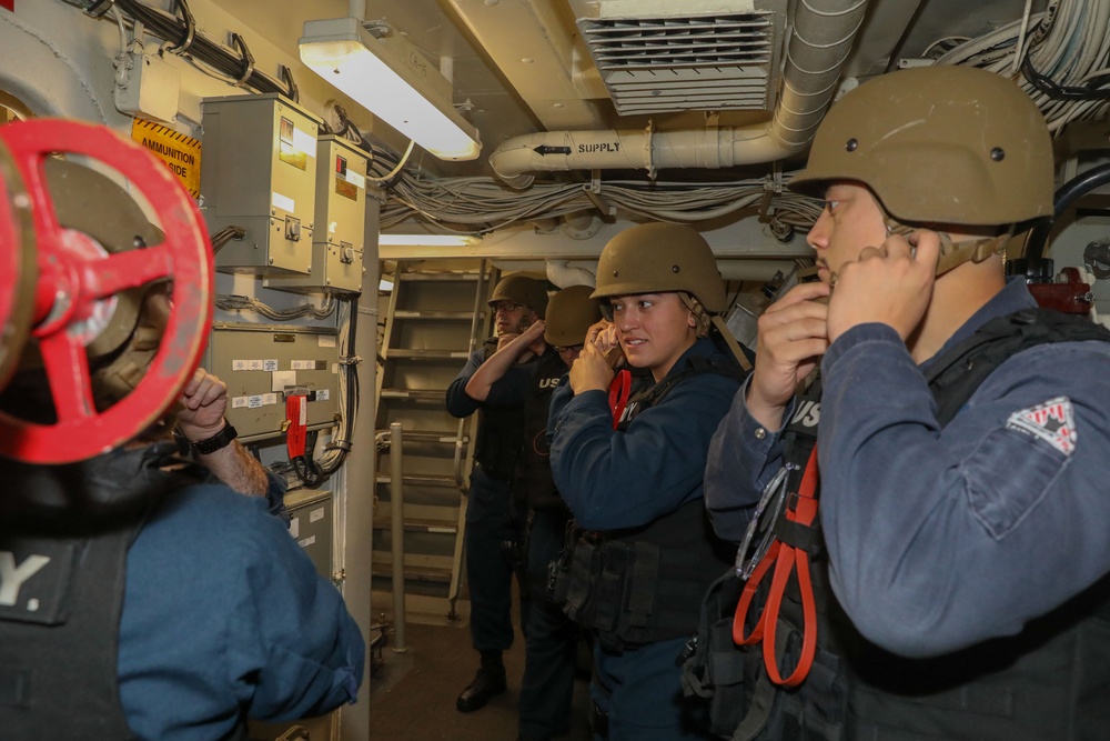 Sailors aboard the USS Howard conduct a security reaction force training exercise in the South China Sea