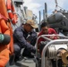 Sailors aboard the USS Howard perform a monthly check on a P-100 in the South China Sea