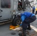 Sailors aboard the USS Howard conduct flight quarters in the South China Sea