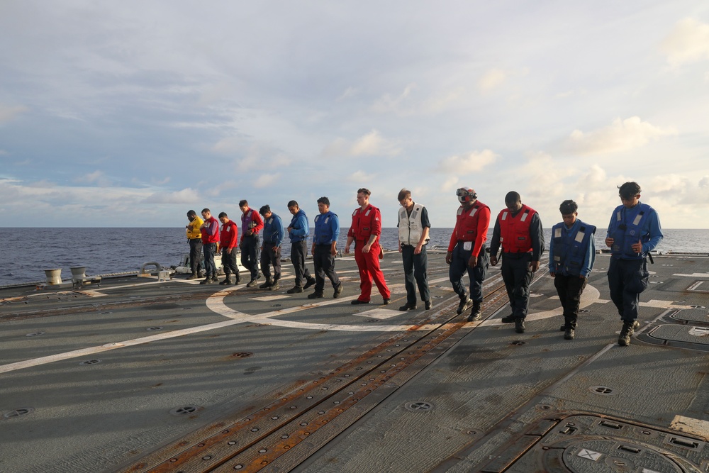 Sailors aboard the USS Howard conduct flight quarters in the South China Sea