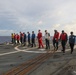 Sailors aboard the USS Howard conduct flight quarters in the South China Sea