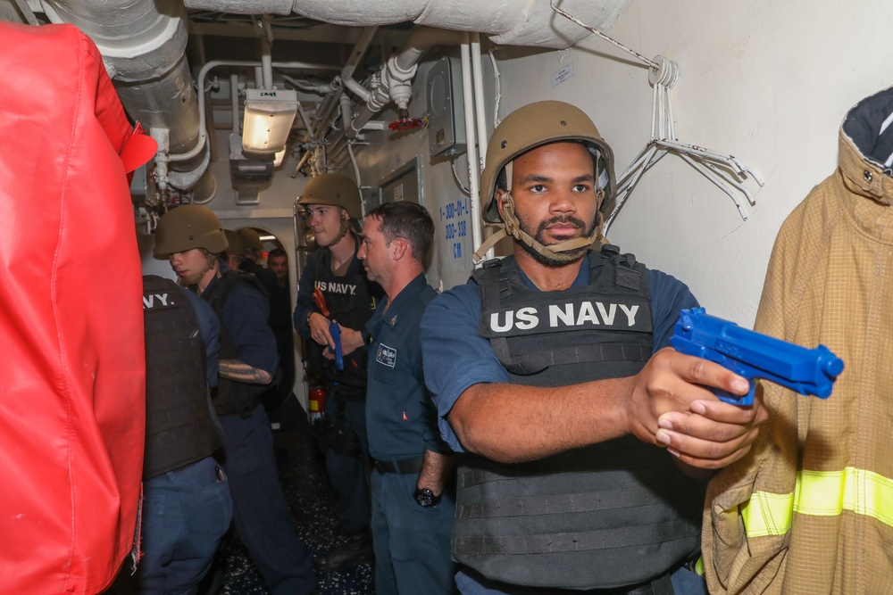 Sailors aboard the USS Howard conduct a security reaction force training exercise in the South China Sea