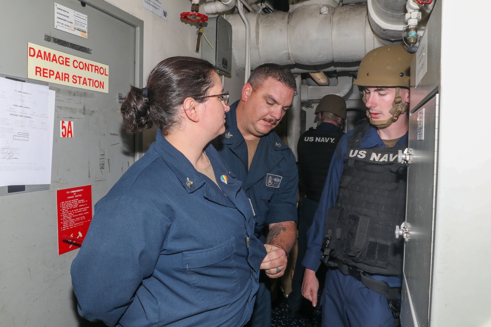 Sailors aboard the USS Howard conduct a security reaction force exercise in the South China Sea