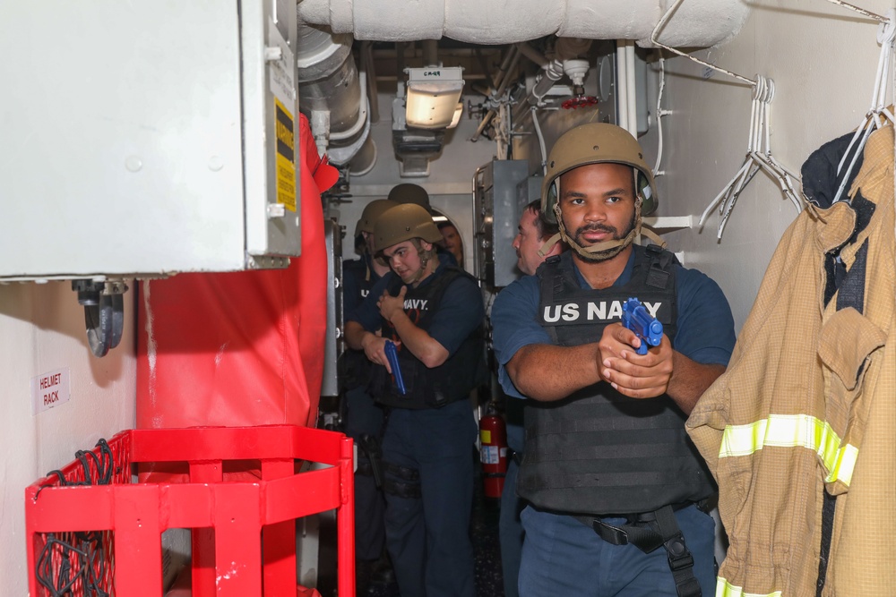 Sailors aboard the USS Howard conduct a security reaction force training exercise in the South China Sea